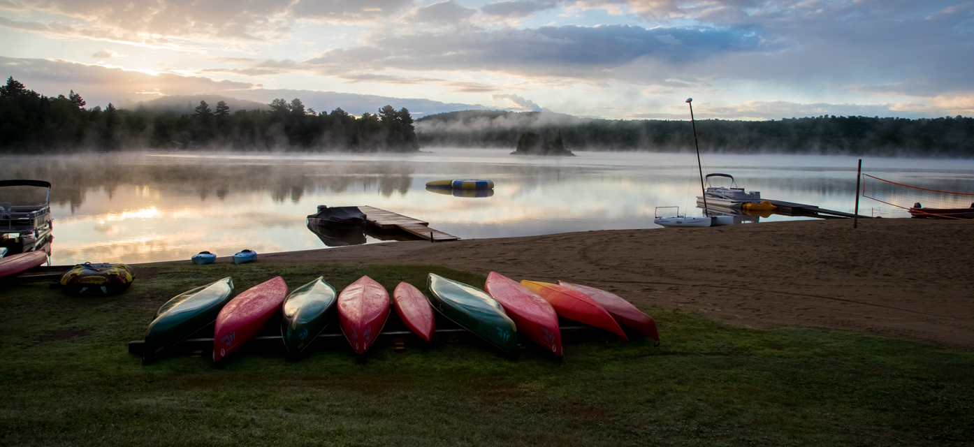 Canoes on the beach, Oxtongue Lake, Ontario